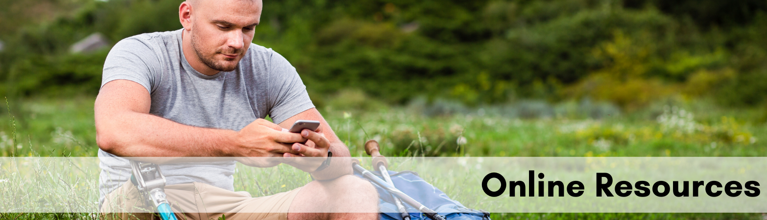 Man with prosthetic leg using a smartphone Man with prosthetic leg using a smartphone